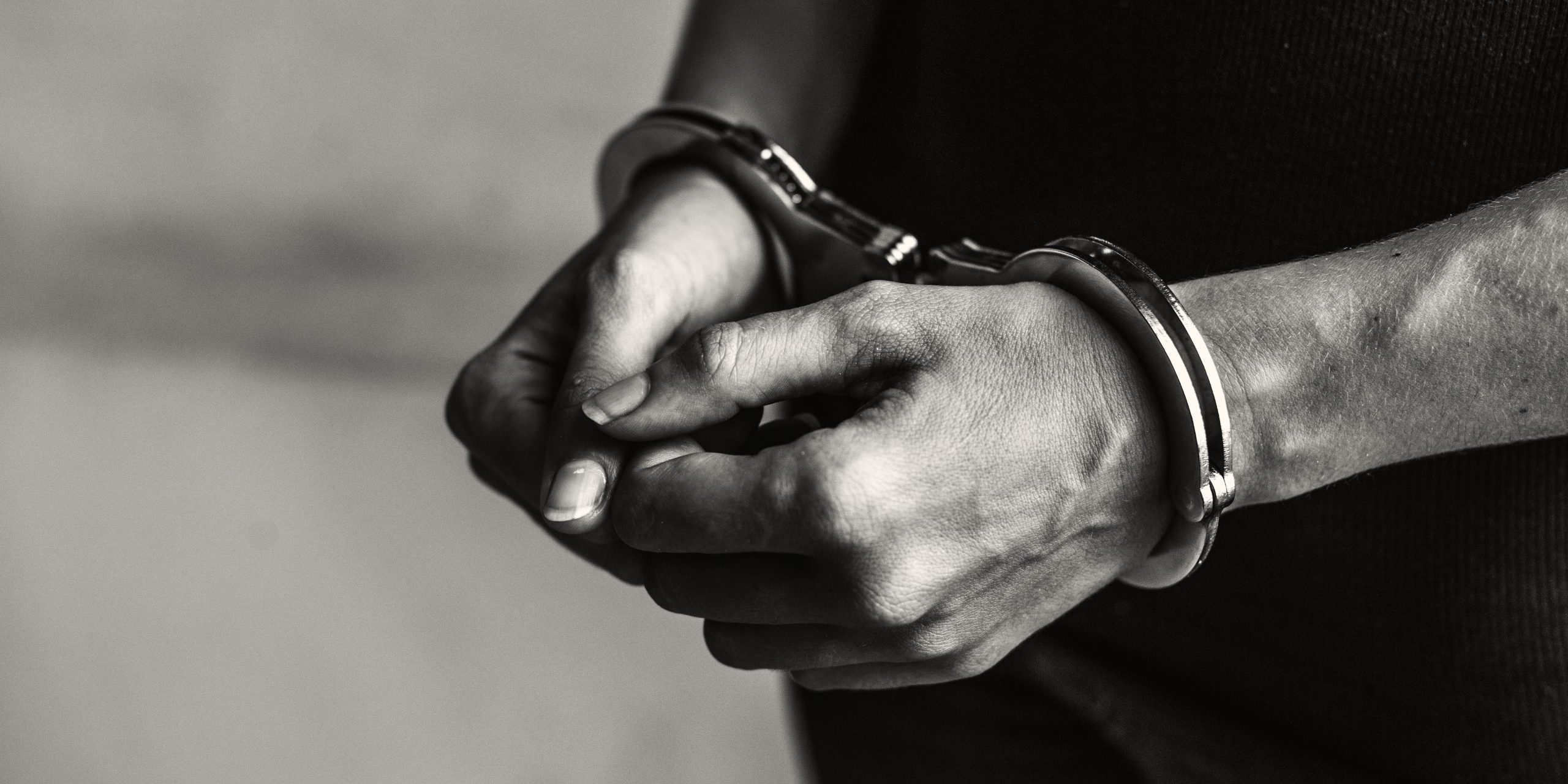 Criminal in handcuffs detention