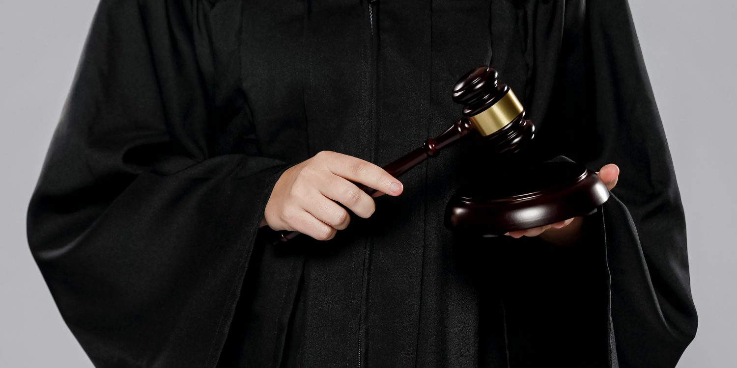front-view-female-judge-with-gavel