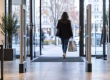 Retail store exit with security gates, representing shoplifting charges in Ontario