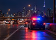 Police traffic stop at night illustrating a stunt driving in Ontario charge